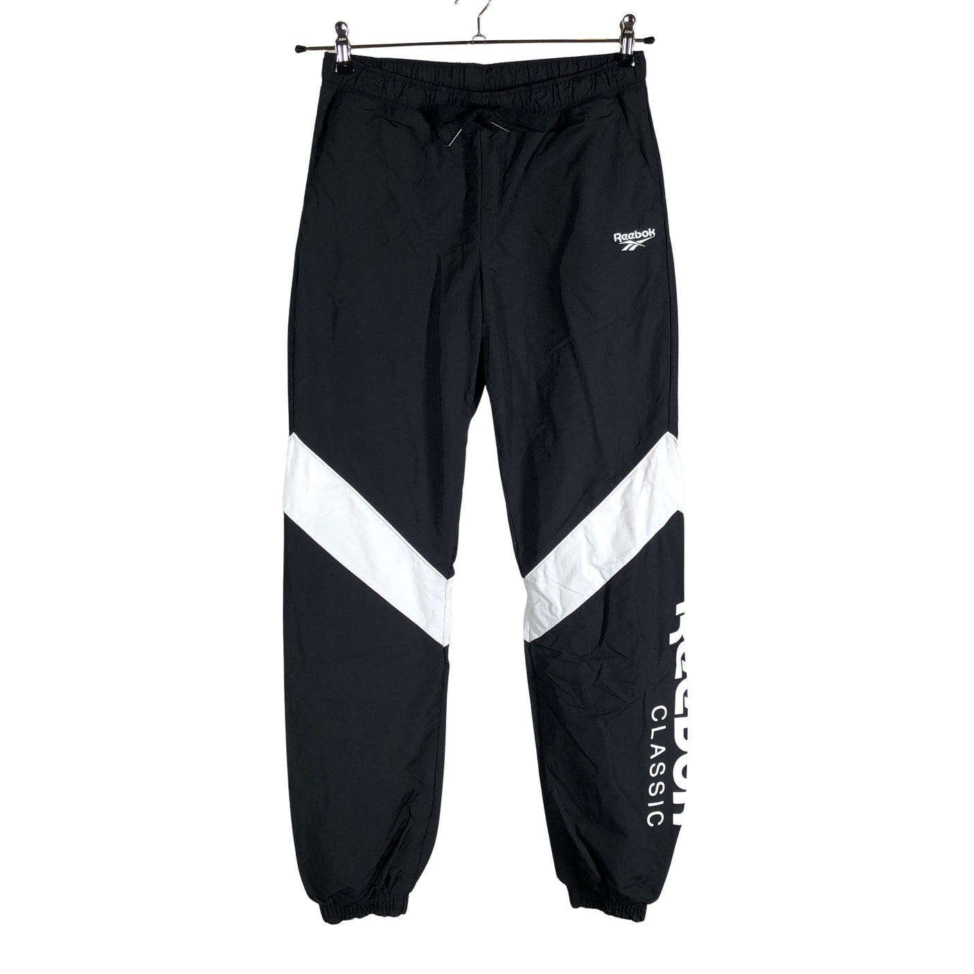 Unisex Reebok - Ulkoiluhousut, koko 34 - (1)