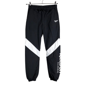 Unisex Reebok - Ulkoiluhousut, koko 34 -  (1)