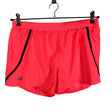 Unisex Under Armour - Sports shorts, size 38 - Orange ()