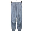 Unisex Nike - Sports trousers, size 34 - Light blue ()