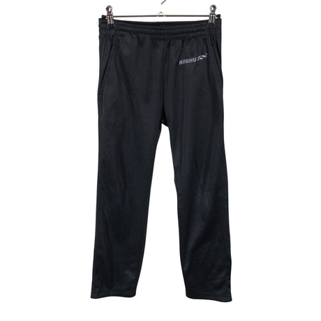 Unisex Karhu - Track pants, size 134 - 140 - Black ()