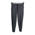 Unisex Under Armour - Sports trousers, size 34 - Gray ()