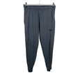 Unisex Nike - Track pants, size M - Gray ()